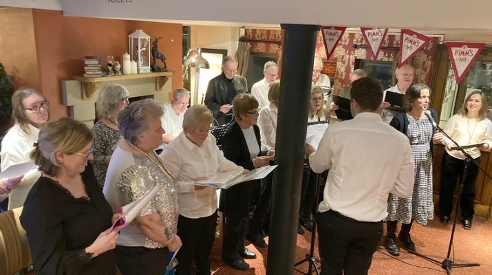 Cassiobury and nearby Community Choir (CanCC) singing at the Essex Arms